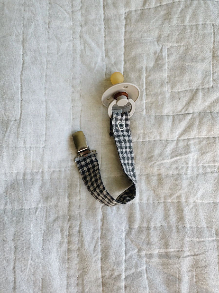 Pacifier clip forest check