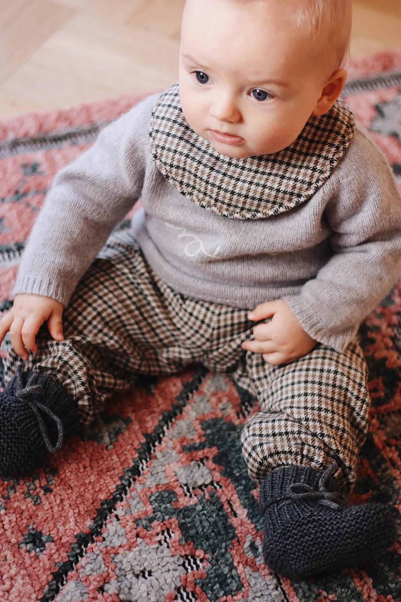 Baby boy wearing Lalaby Alpha shoes in storm grey cashmere