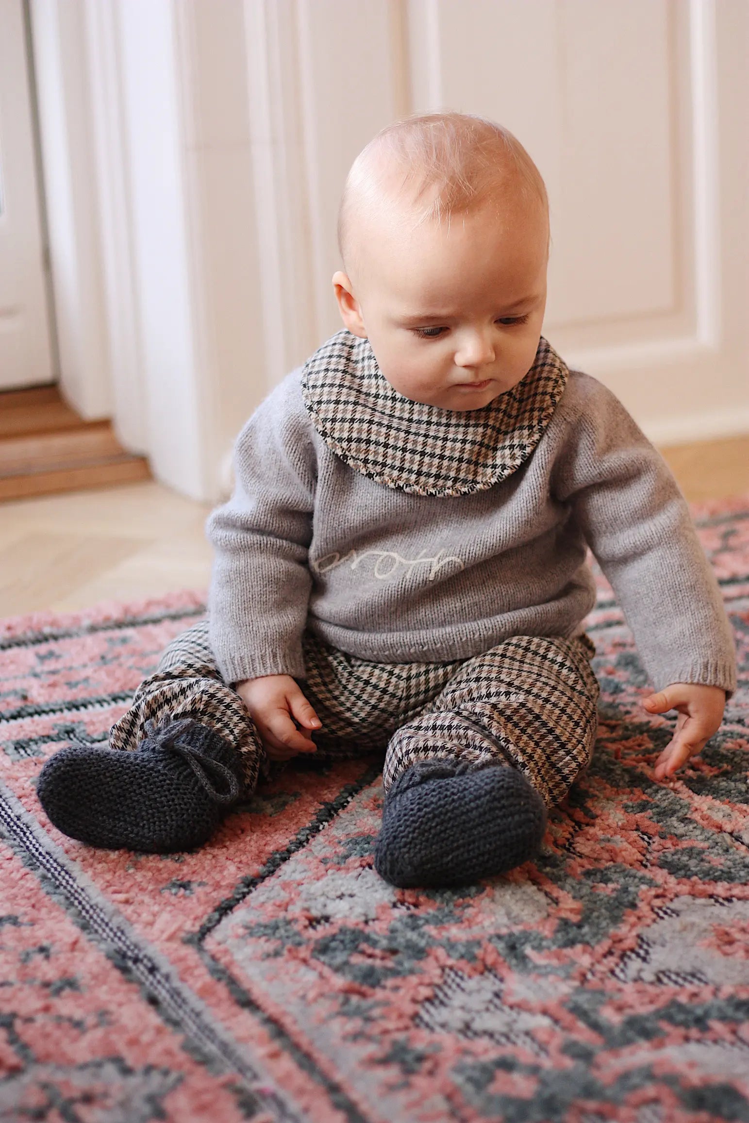 Baby boy wearing Lalaby Alpha shoes in storm grey cashmere