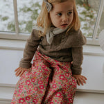 Girl wearing Lalaby Atlas scarf in bluey light blue cashmere