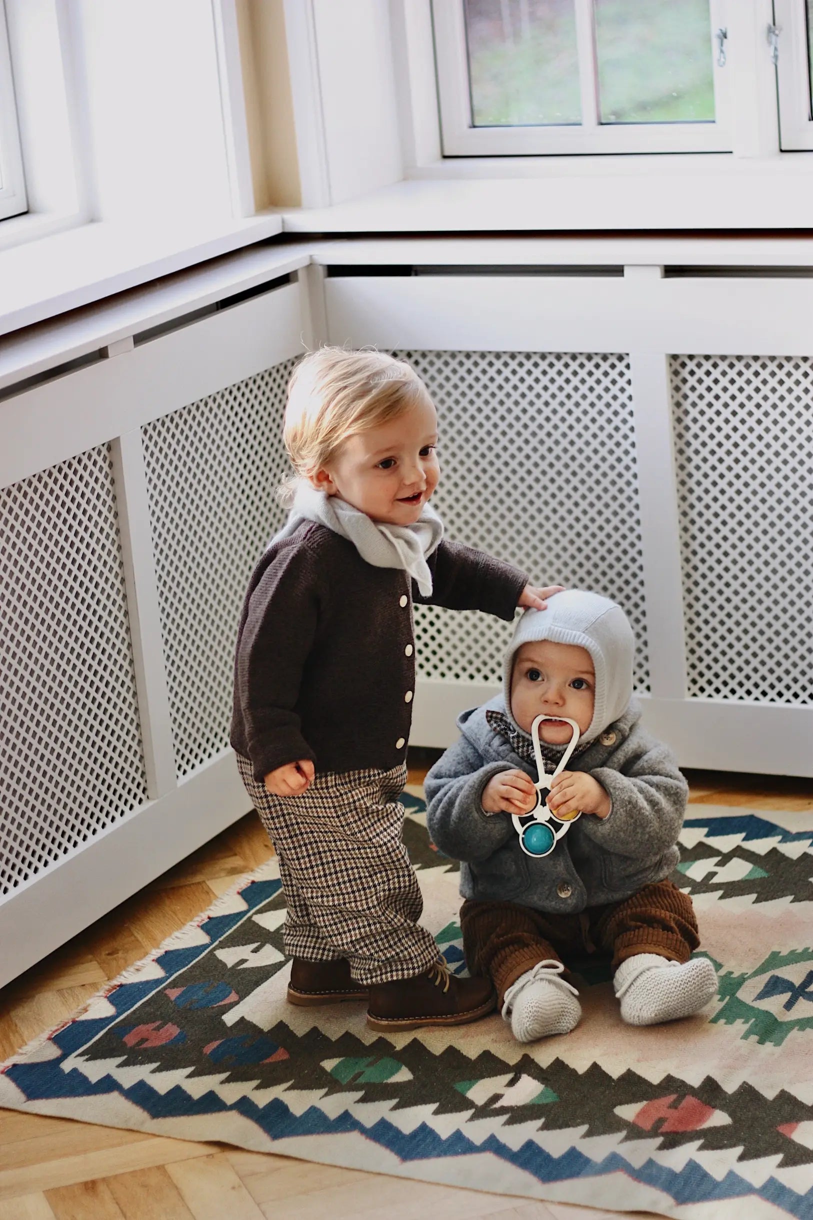 Baby boy wearing Lalaby Atlas scarf in bluey light blue cashmere