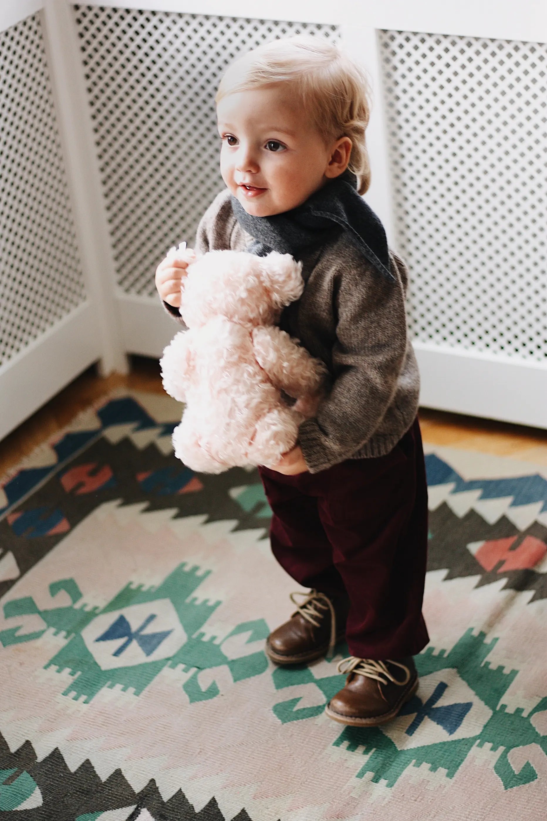 Baby boy wearing Lalaby Atlas scarf for babies, kids and adults in storm grey cashmere