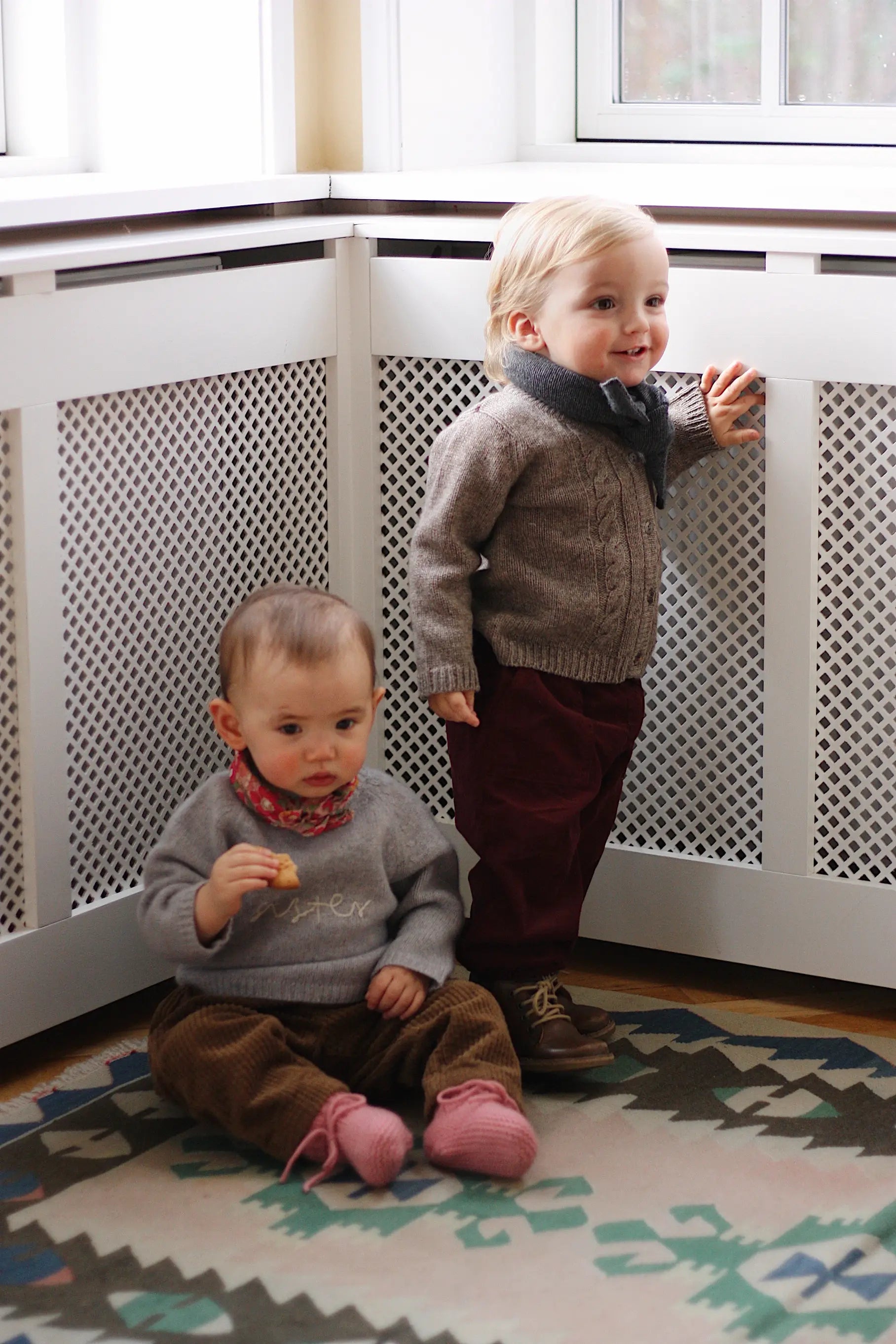 Baby boy wearing Lalaby Atlas scarf for babies, kids and adults in storm grey cashmere