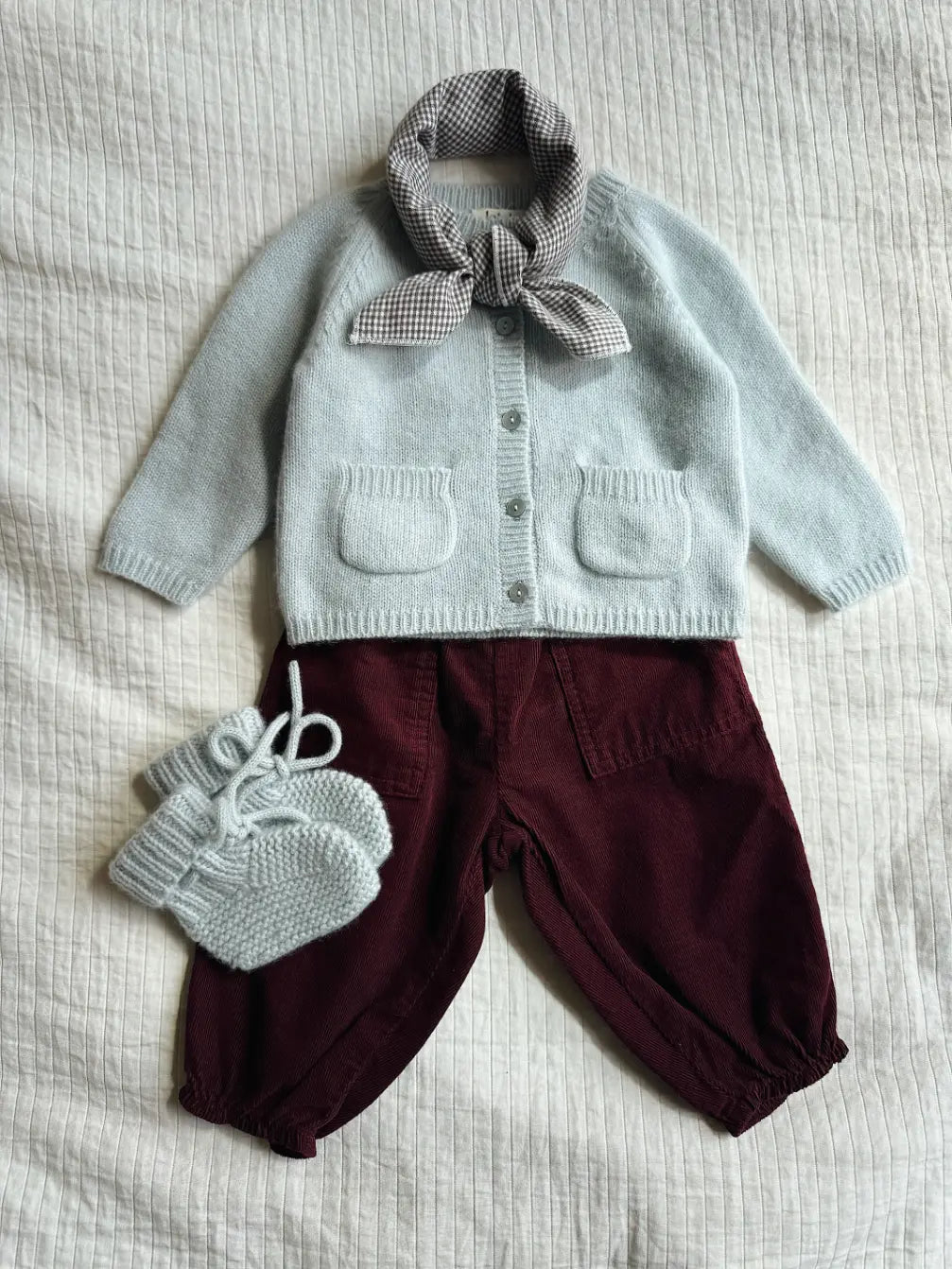 Lalaby AW26 baby boy look in shades of bluey, ruby & tiny check brown