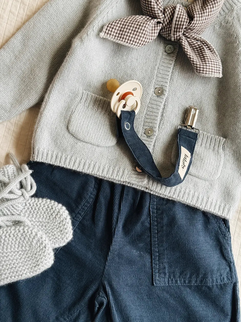 Lalaby baby boy look in shades of bluey, whale and tiny check brown.