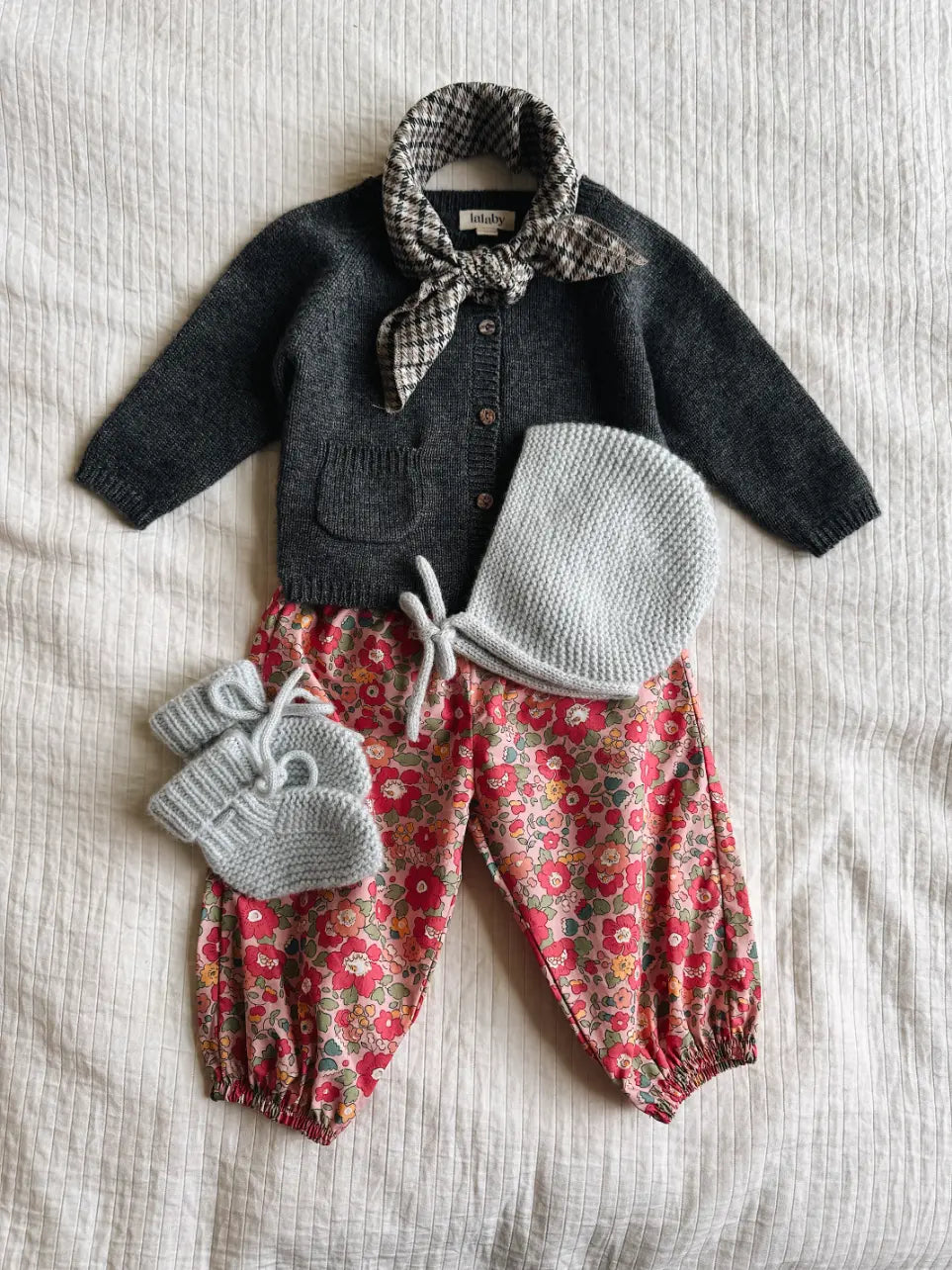 Lalaby AW26 baby girl look in shades of storm, berry betsy, bluey & tweedy