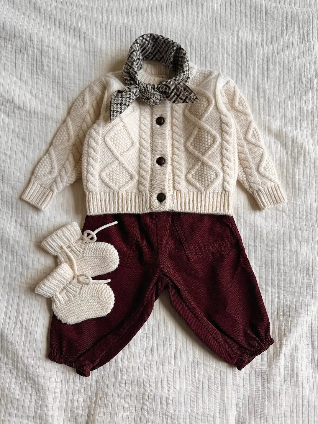 Lalaby AW26 baby boy look in shades of natural, tweedy & ruby