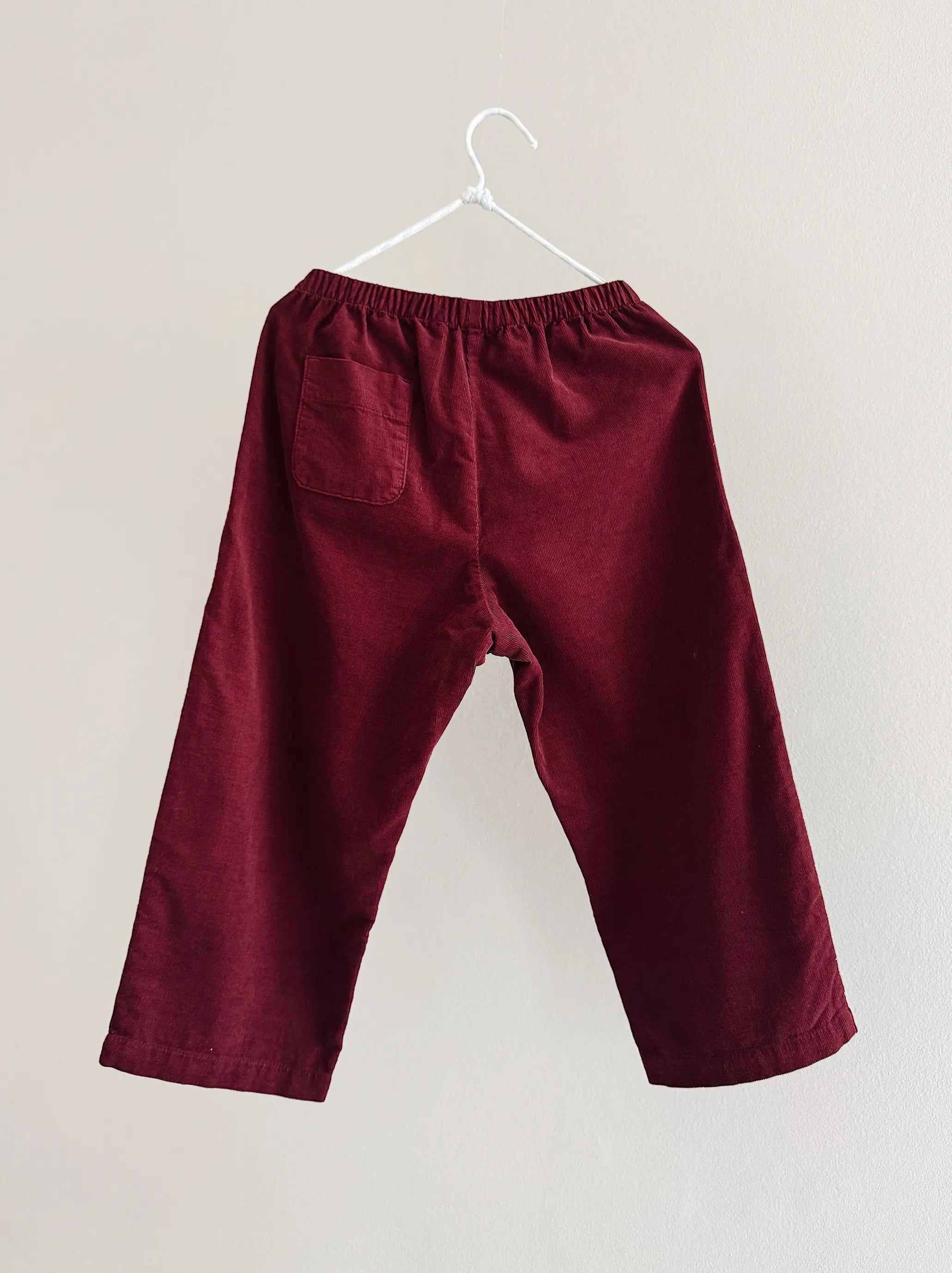 Lalaby Axel trousers for kids in ruby red cotton baby cord