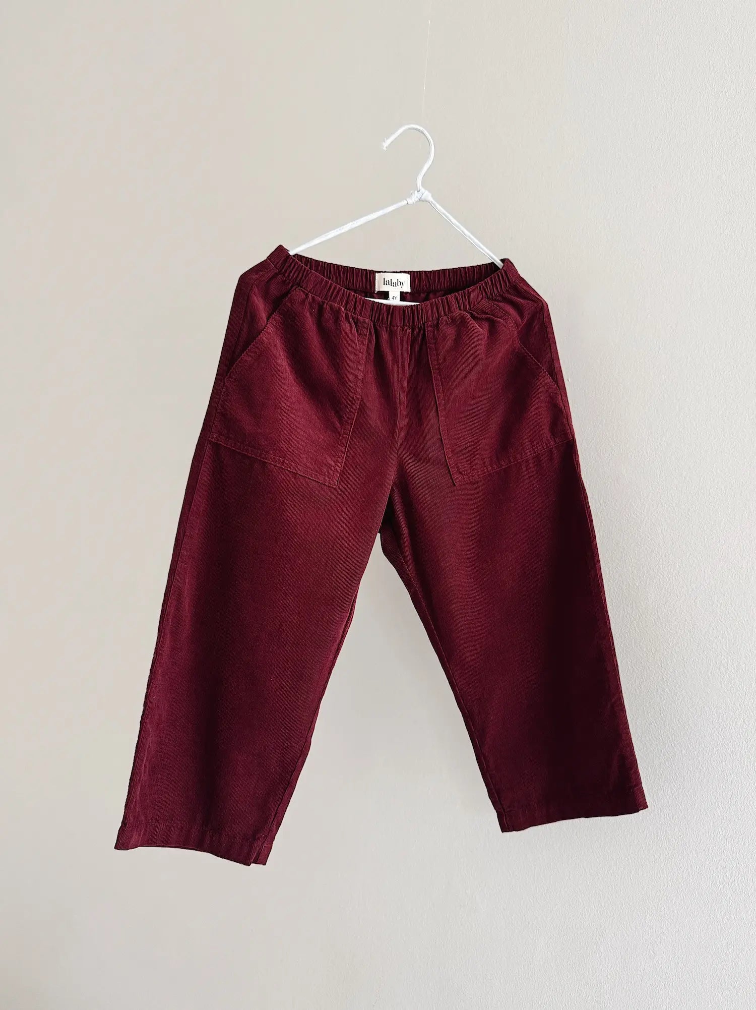 Lalaby Axel trousers for kids in ruby red cotton baby cord