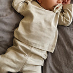 Baby boy wearing Lalaby Baloo set in 100% organic cotton interlock in the shade cloud