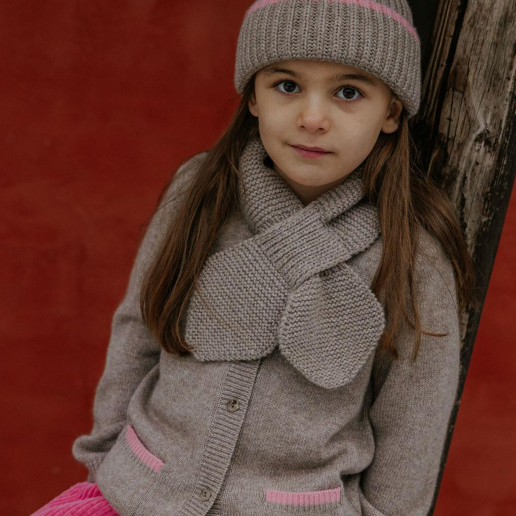 Girl wearing Lalaby Betty cardigan in toast brown cashmere