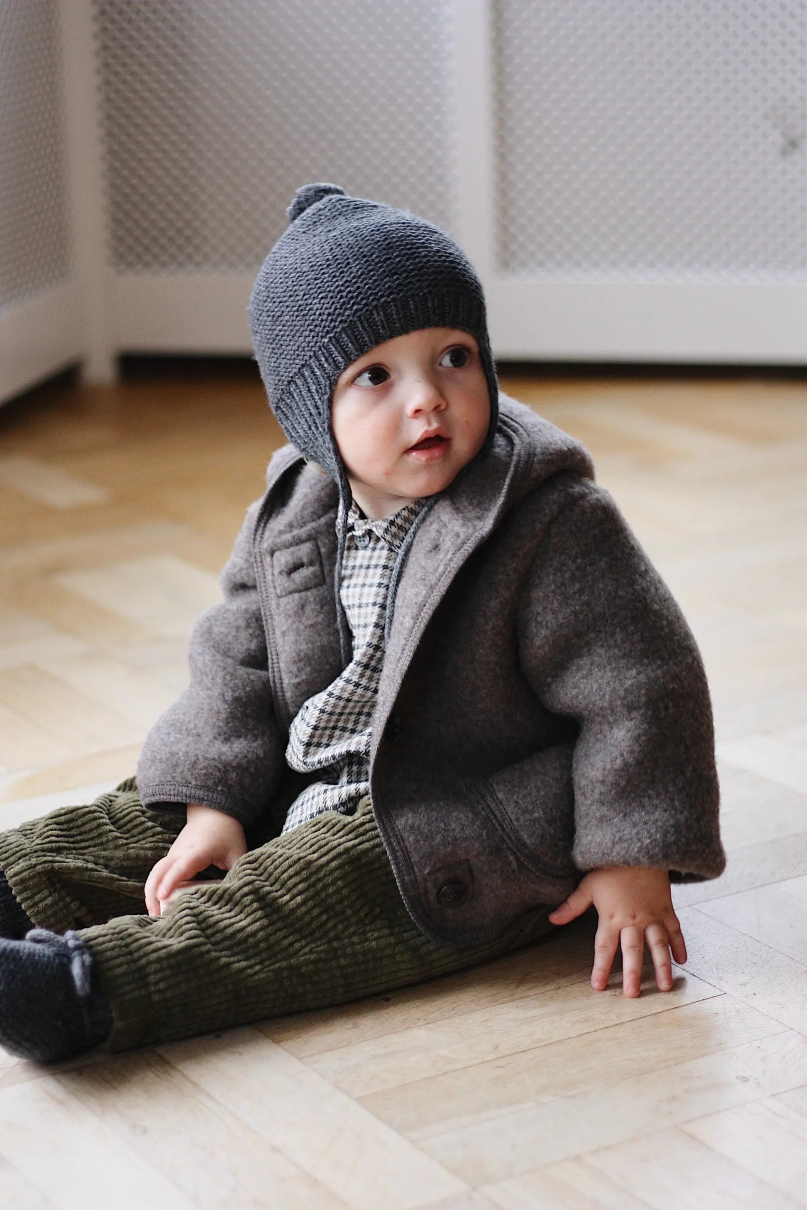 Baby boy wearing Lalaby Bobo hat in storm grey cashmere