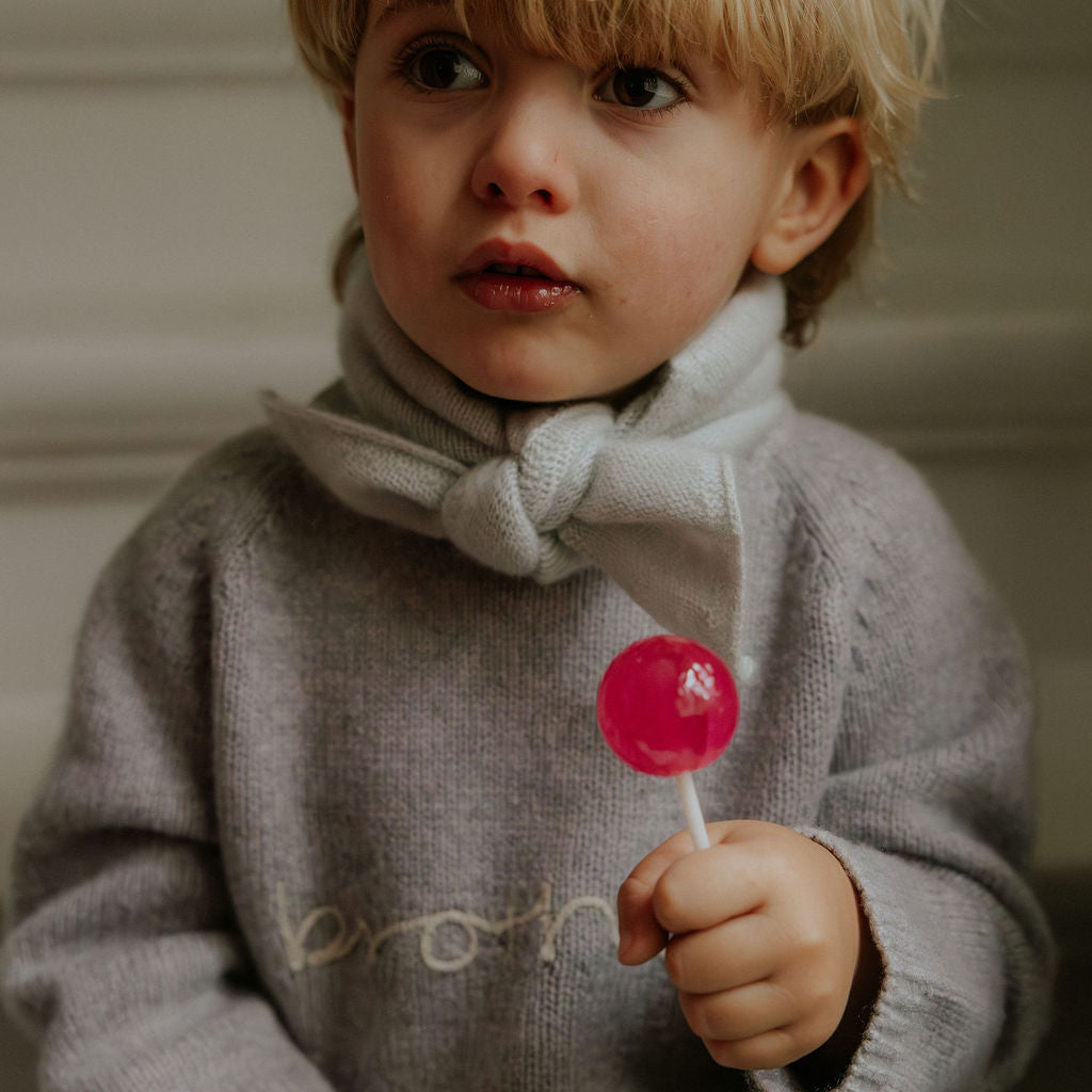 Boy wearing Lalaby Brother sweater in a grey baby wool, yak and cashnere blend