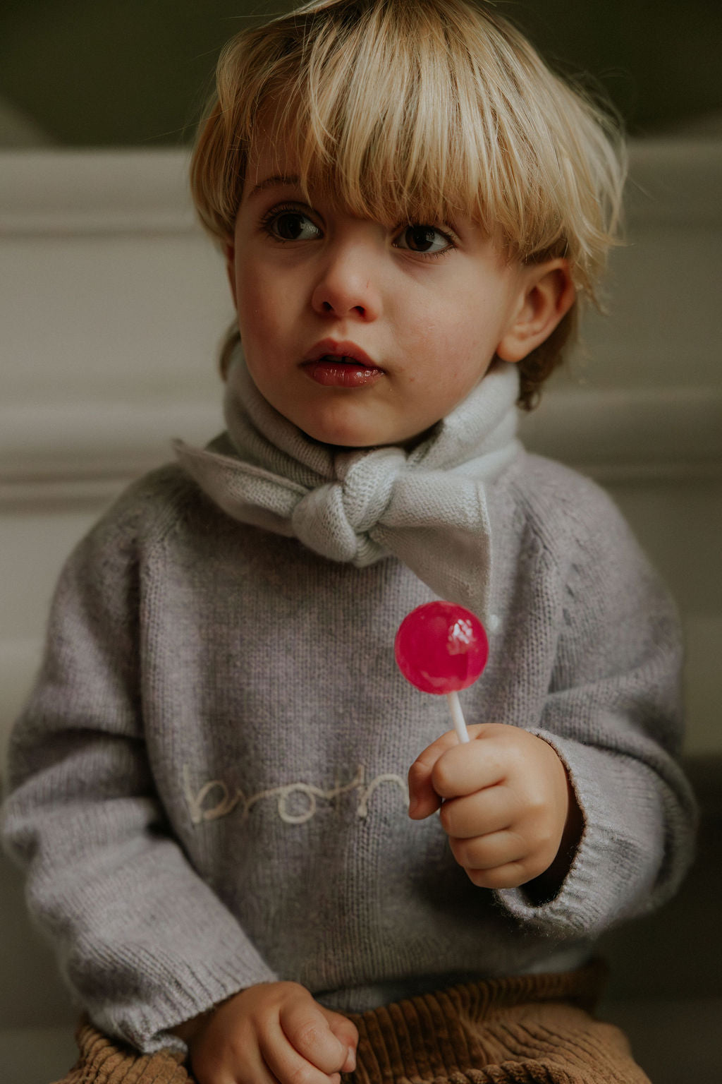 Boy wearing Lalaby Brother sweater in a grey baby wool, yak and cashnere blend