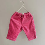 Lalaby Charlie trousers for babies in flamingo pink organic cotton mega cord