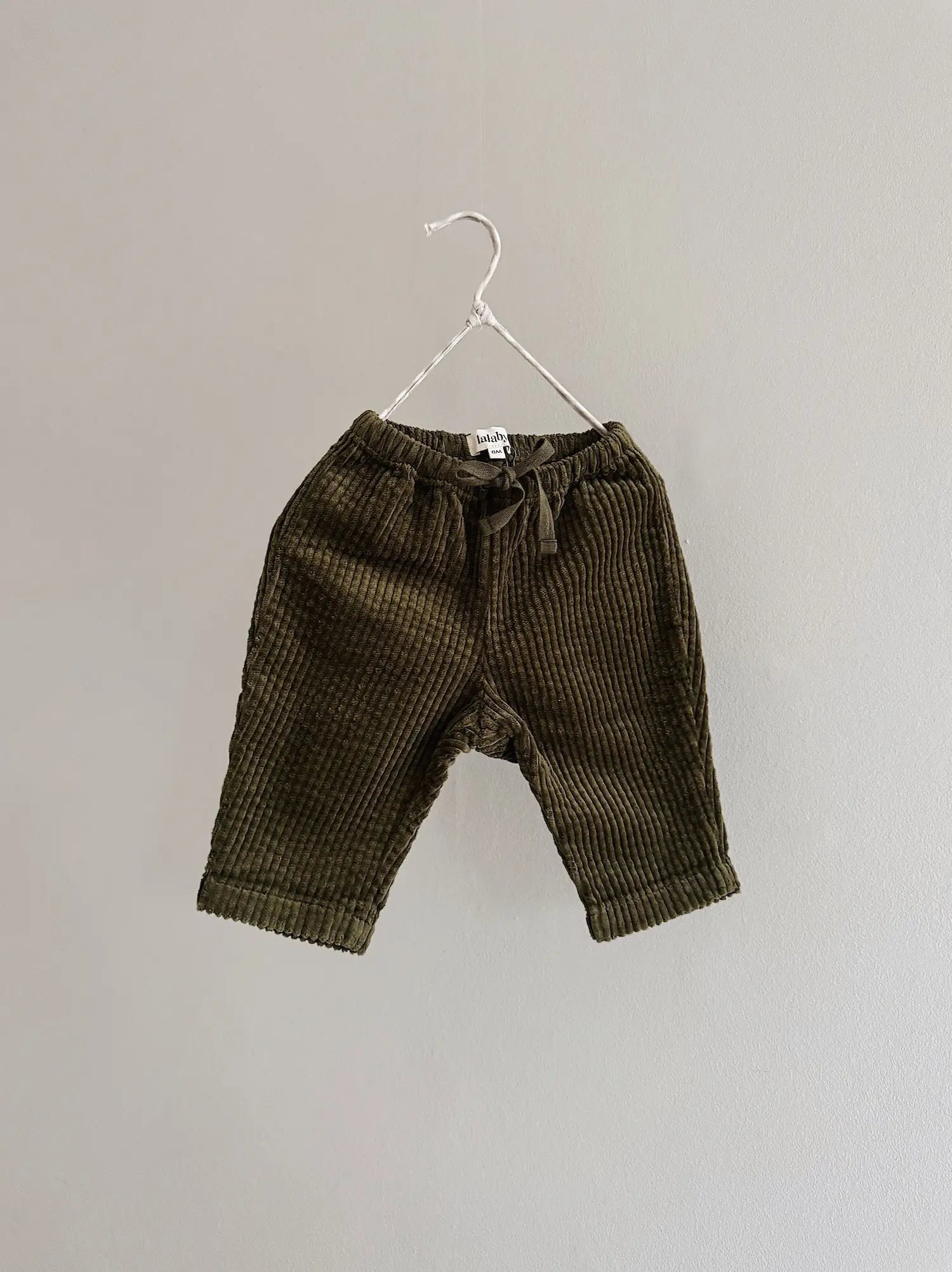 Lalaby Charlie baby trousers in forest green organic cotton mega cord