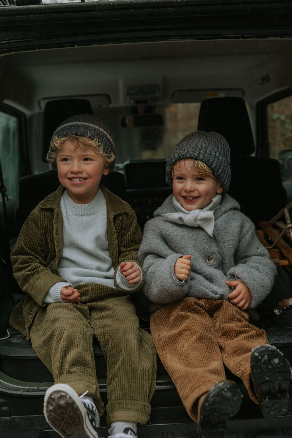 Boy wearing Lalaby Charlie trousers for kids in cookie brown organic cotton mega cord