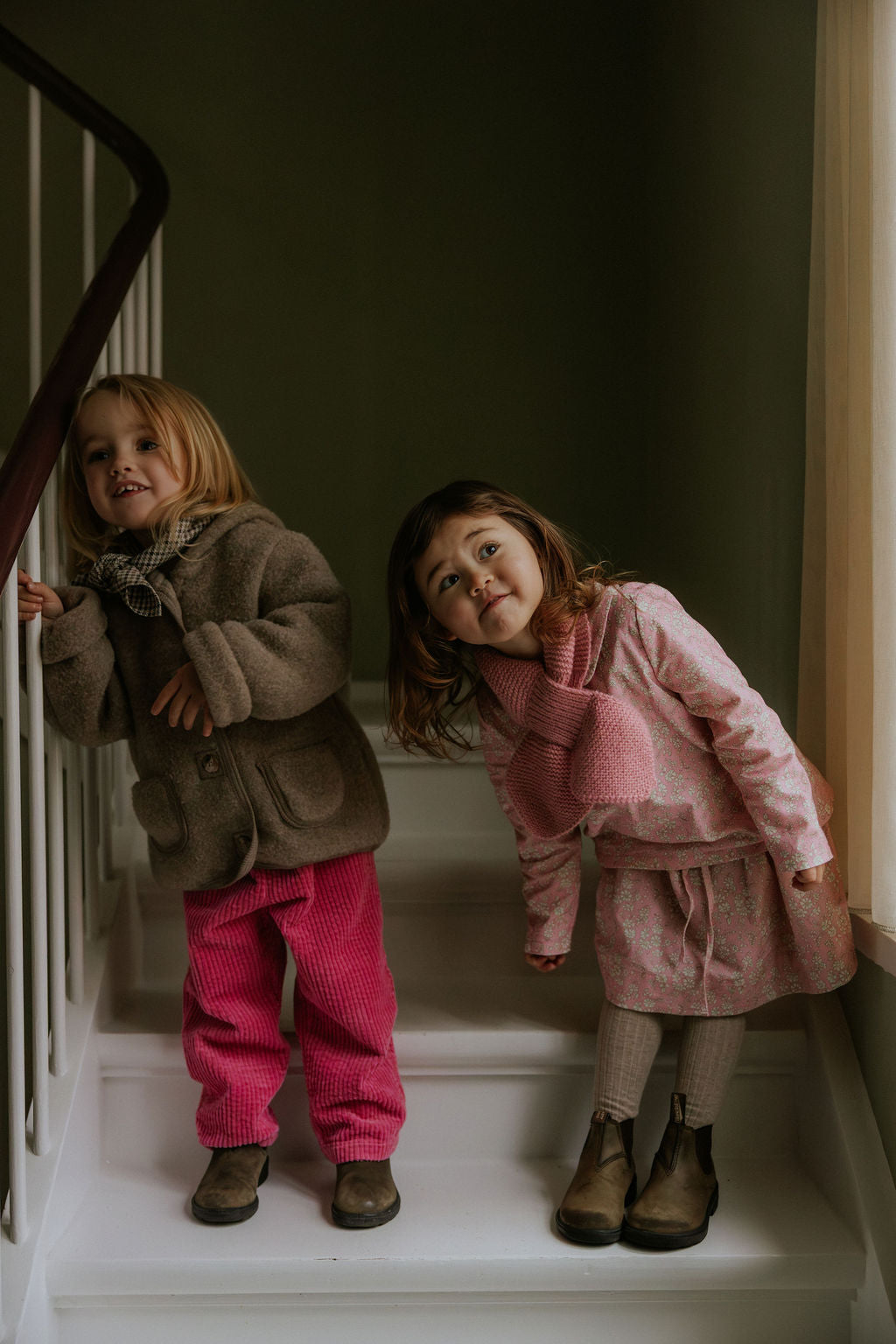 Girl wearing Lalaby Charlie trousers for kids in flamingo pink organic cotton mega cord
