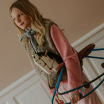 Girl wearing Lalaby Colin jumper in sorbet pink cashmere