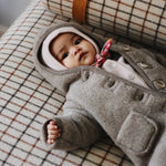 Baby girl wearing Lalaby Eddie scarf for babies and kids in Berry besty pink liberty organic cotton