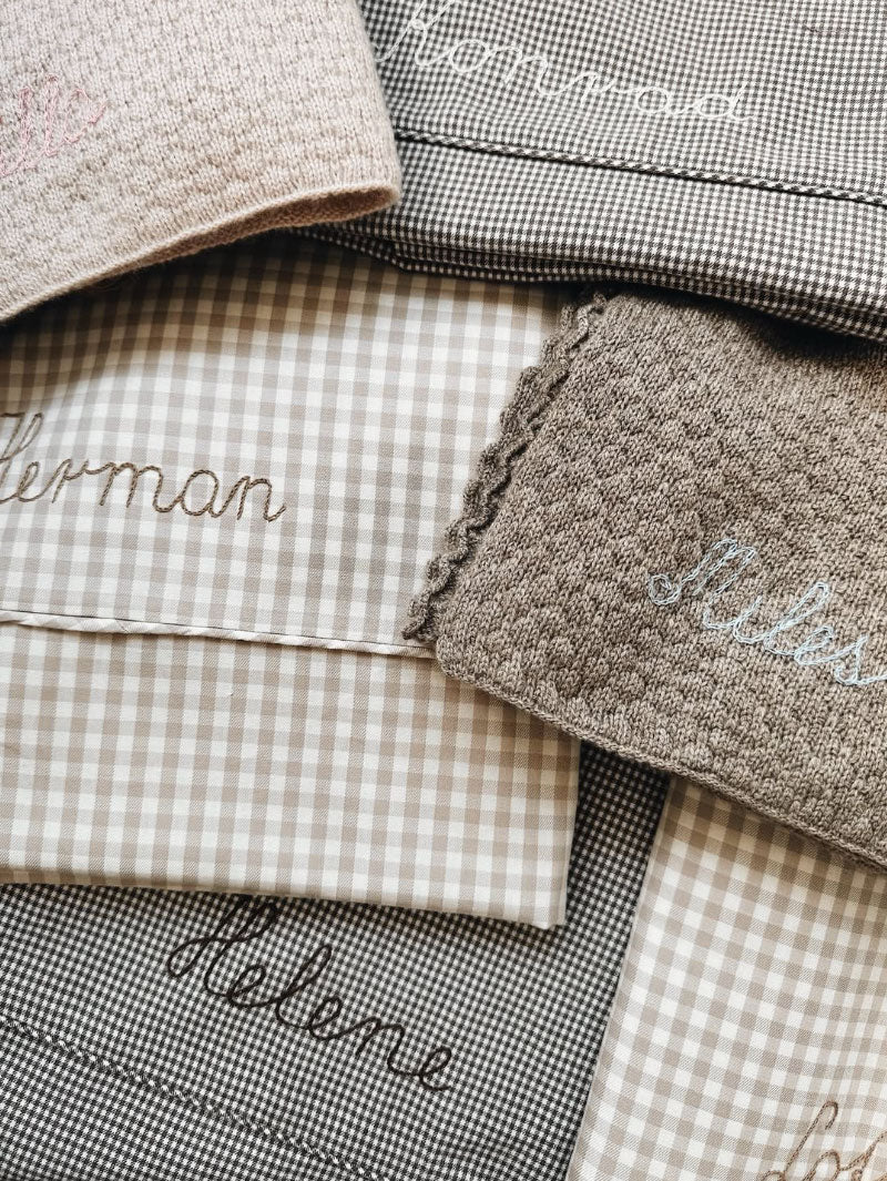 Handembroidered Lalaby Classic bedding and Aura blankets