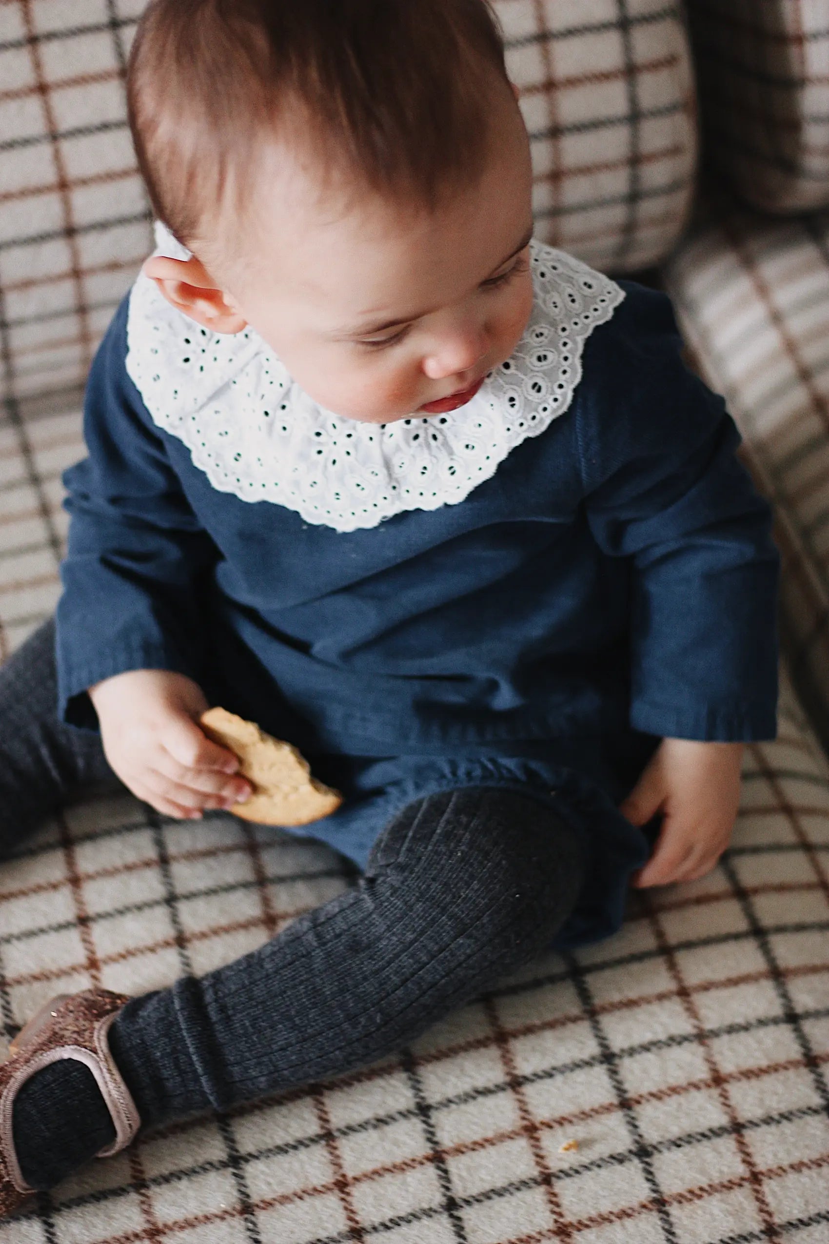 Baby girl wearing Lalaby Lucy set in whale blue cotton baby corduroy