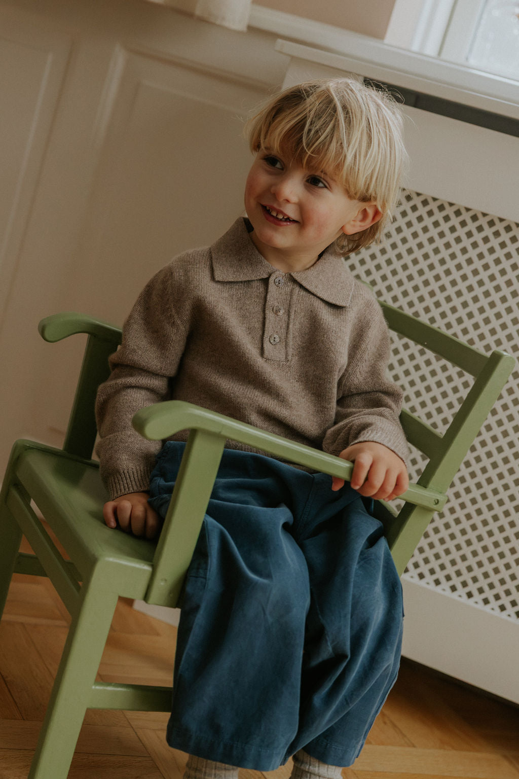 Boy wearing Lalaby Maxi pants for kids in whale blue cotton baby cord