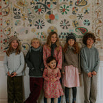 Girl wearing Lalaby Oda cardigan in bluey light blue cashmere