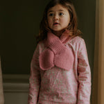 Girl wearing Lalaby Oya kids top in pink flower liberty cotton corduroy