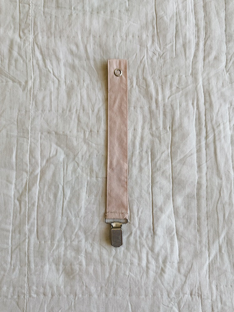 Lalaby pacifier clip for babies in blush pink organic cotton