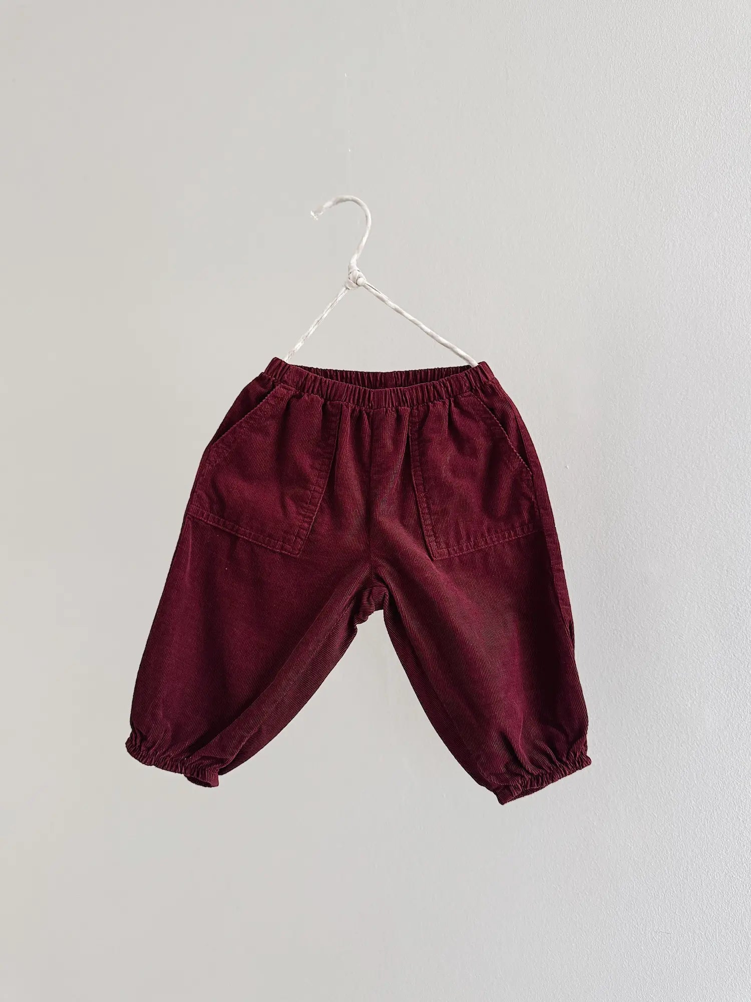 Lalaby Panda pants for babies in ruby red cotton baby cord