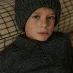 Boy wearing Lalaby Pauli polo in storm grey cashmere