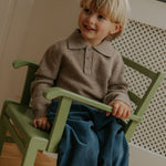 Boy wearing Lalaby Pauli polo in toast brown cashmere