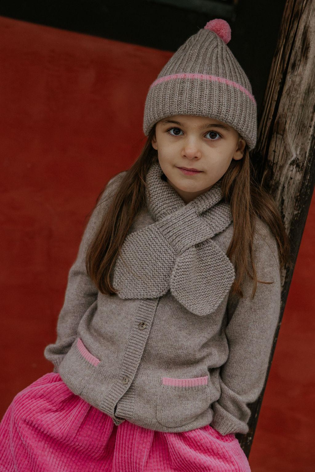 Girl wearing Lalaby Rita scarf in toast brown cashmere
