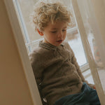 Boy wearing Lalaby Saxo kids shirt in tweedy check organic cotton
