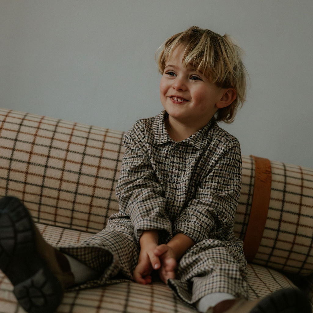 Boy wearing Lalaby Saxo kids shirt in tweedy check organic cotton
