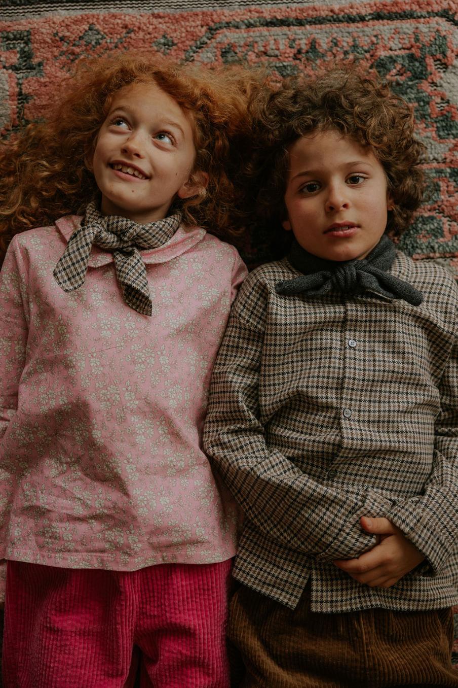Boy wearing Lalaby Saxo kids shirt in tweedy check organic cotton