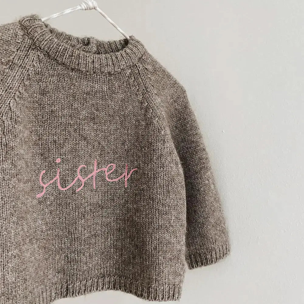 Lalaby Sister baby sweater in a millet brown baby wool, yak and cashmere blend
