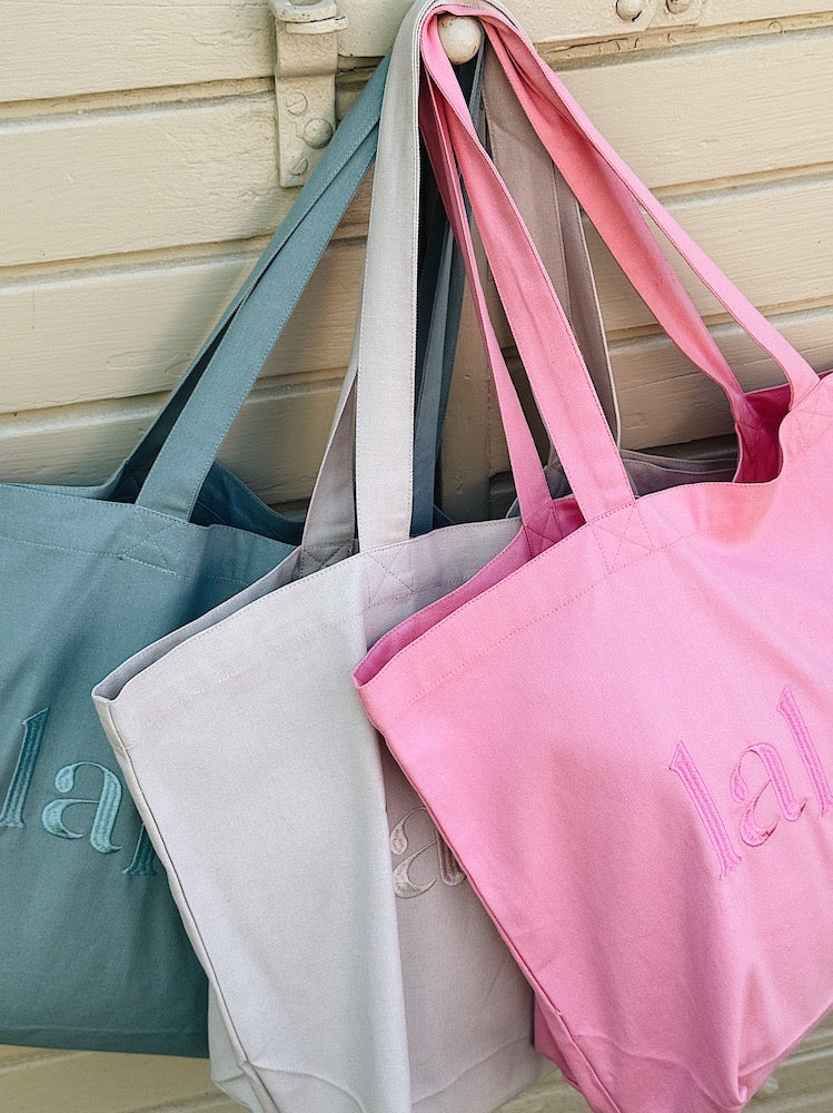 Lalaby Toto tote bags in three colorways; sorbet pink, natural beige and pool blue, made from organic cotton, for everyday use