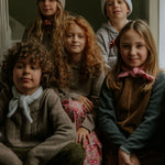 Girl wearing Lalaby Winston hat in toast brown cashmere