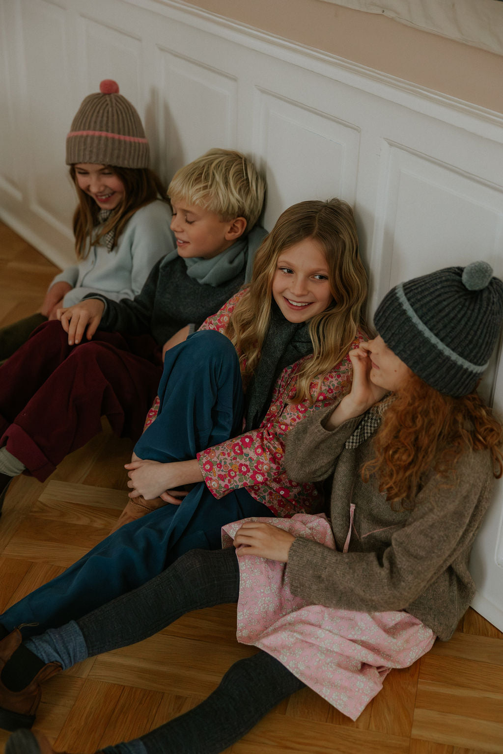 Girl wearing Lalaby Winston hat in toast brown cashmere